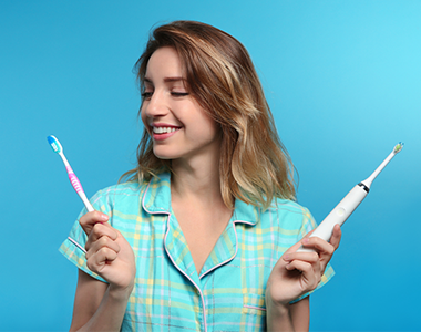 Electric vs manual brushing, which is better?- treatment at comfortsmiles in Ann Arbor  