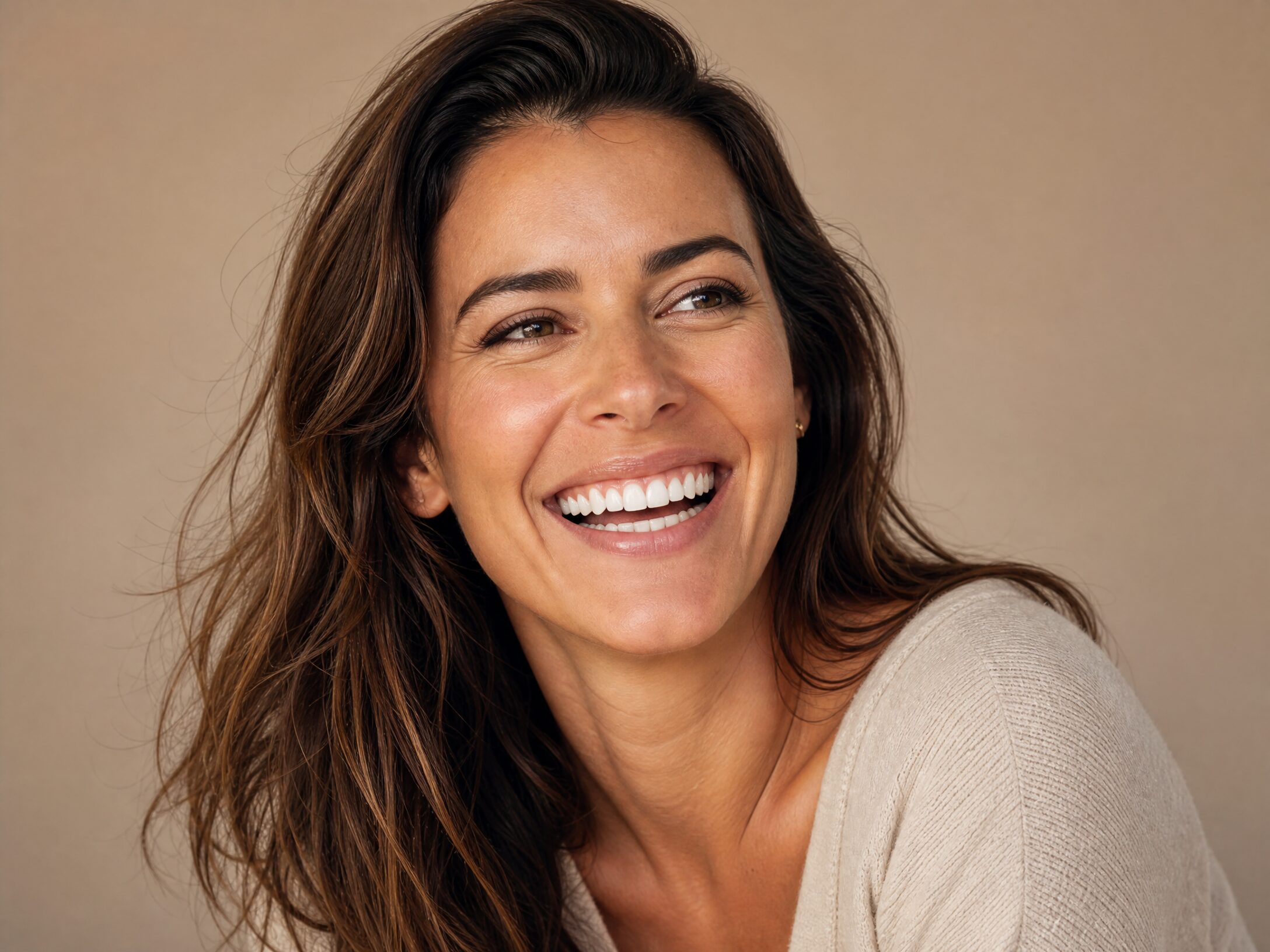 Adult patient with healthy confident smile after dental sealant treatment at Comfort Smiles Ann Arbor